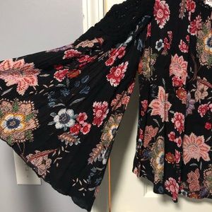 Bila multi-colored Cold shoulder top. Size M.